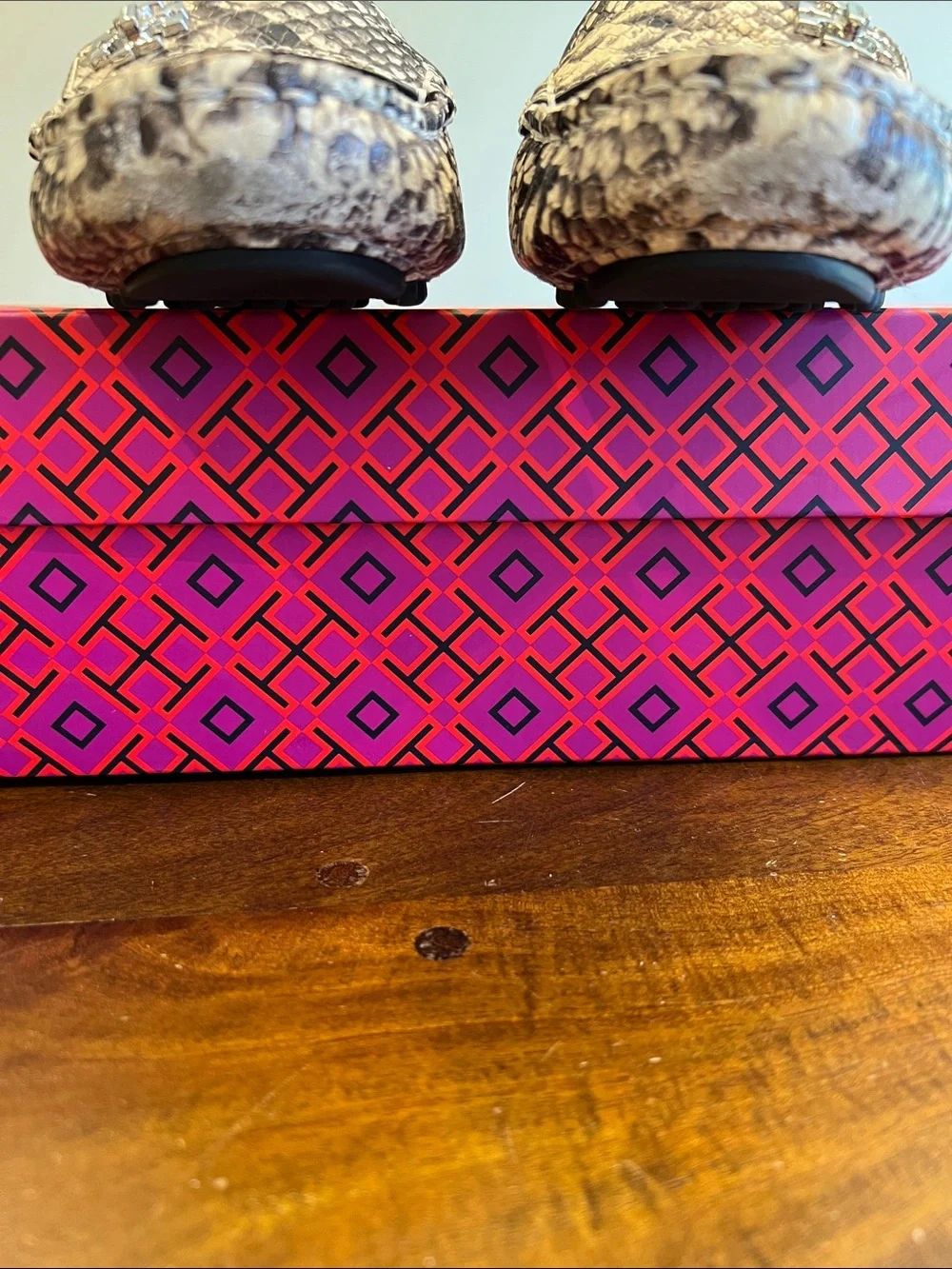 Tory Burch Snake-Embossed Penny Loafers in Black and Cream